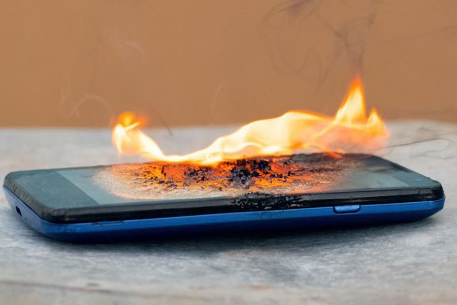 a phone being on fire because of overheating and not knowing how to cool phone while gaming.