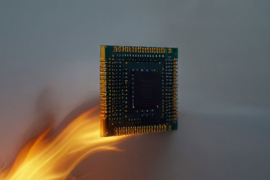 Picture of a CPU burning with overheat. measuring cpu temperature while gaming can help you prevent such incidents.