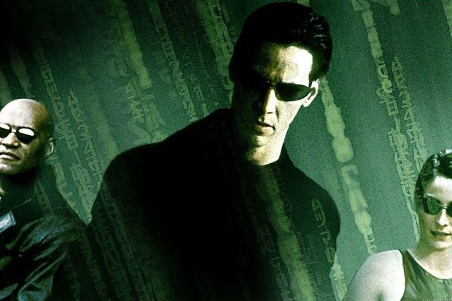 poster of the first movie in the Matrix series, with Three core characters, one of the best movies for gamers