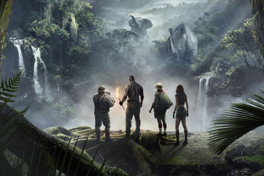 official poster of Jumanji: Welcome to the Jungle, featuring the four main characters, one of the best movies for gamers