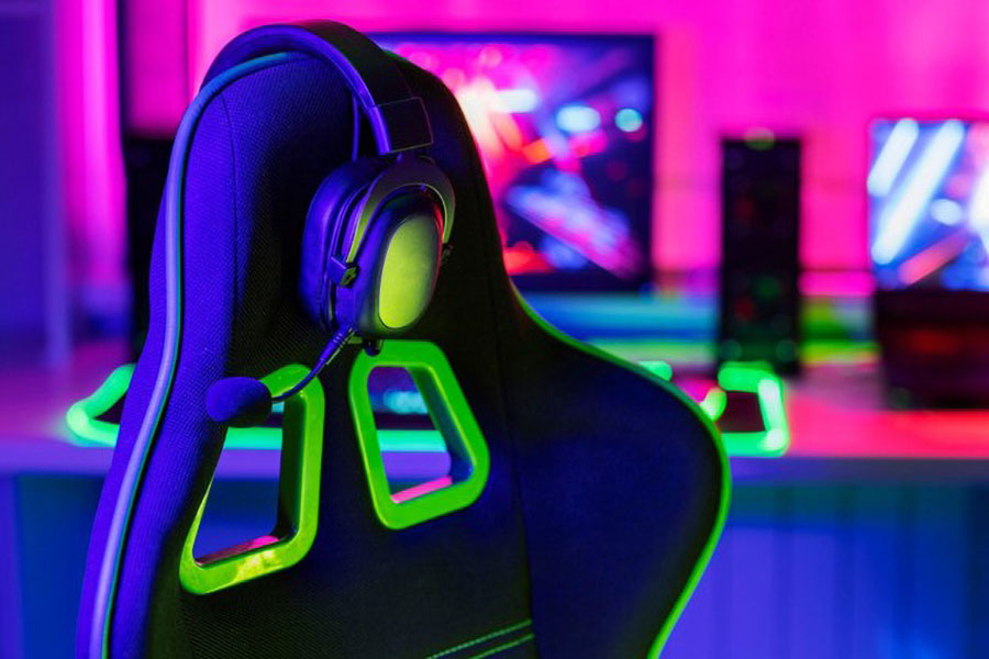 Picture of a Headset on a gaming chair, One of equipment needed to start a gaming youtube channel.