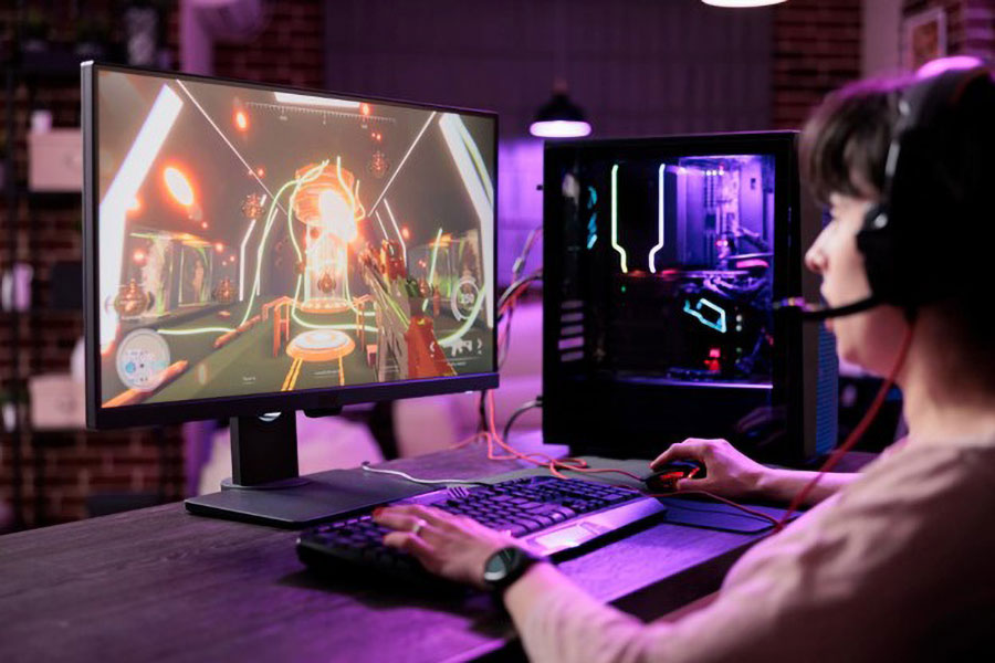 Picture of a Pro Gamer in front of his setup. If You’re in the gaming business it’s good to learn how many gamers are there in the world.