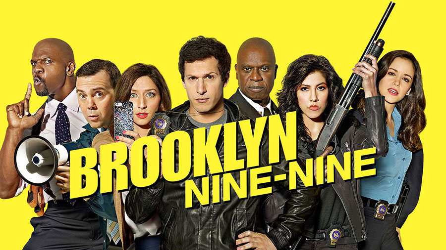 The cast of Brooklyn Nine-Nine at the police station.