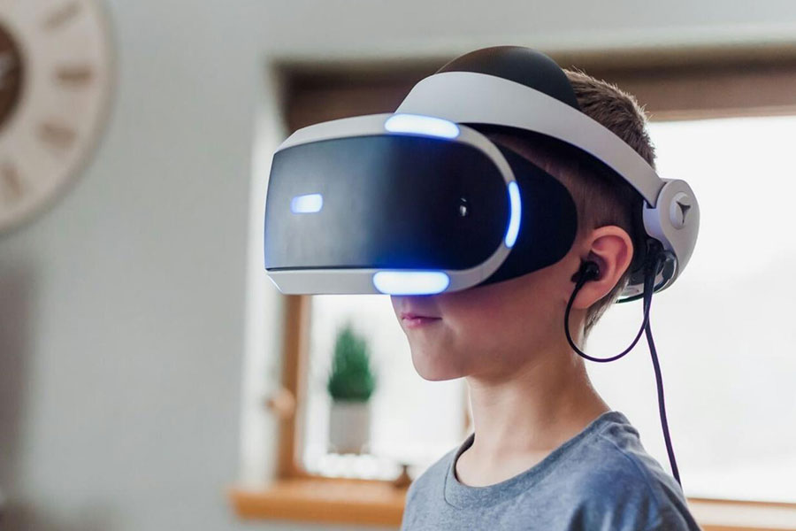 Picture of a child with Virtual Reality Headset on, a wedding gift for video gamer.