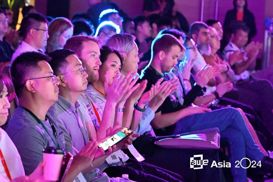 a bunch of people sitting in festival of AWE Asia 2025.