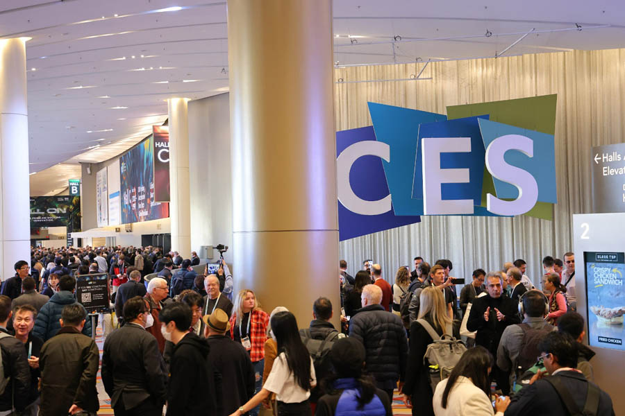 a hall filled with people in conference of CES Digital 2025.