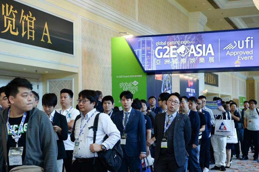 a group of people in line in festival of G2E Asia 2025.