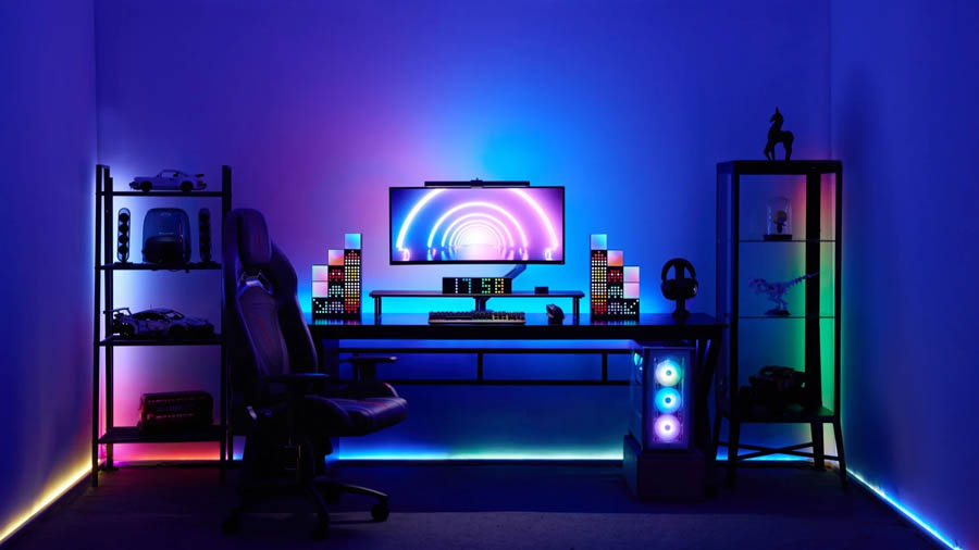 Image of a gaming room with posters and a bookshelf on the left side.