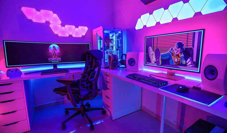 Image of a gaming setup with pink color pallet.