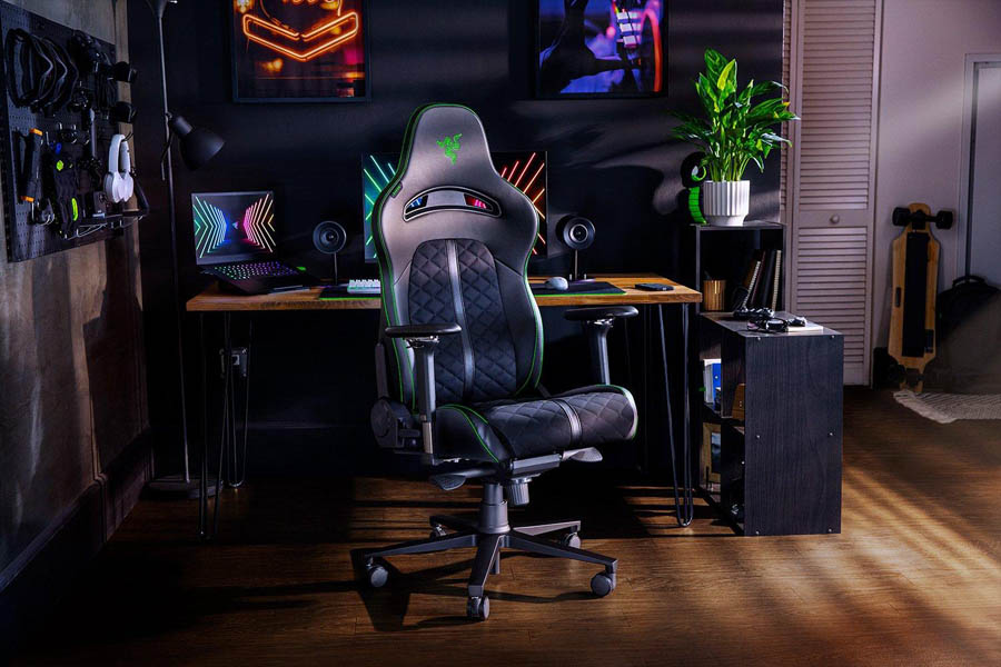 Image of a gaming room with two setups and gaming chairs.